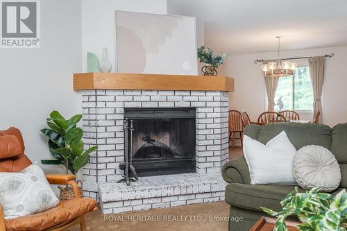 311 - 1102 Horseshoe Valley Road W, Oro-Medonte (Horseshoe Valley), ON - Indoor Photo Showing Living Room With Fireplace