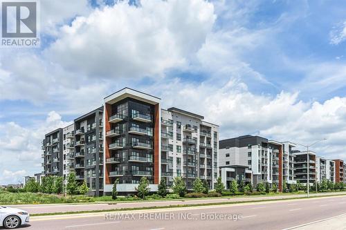 421 - 102 Grovewood Common Circle, Oakville, ON - Outdoor With Facade