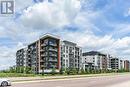 421 - 102 Grovewood Common Circle, Oakville, ON  - Outdoor With Facade 