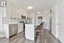 421 - 102 Grovewood Common Circle, Oakville, ON  - Indoor Photo Showing Kitchen With Upgraded Kitchen 