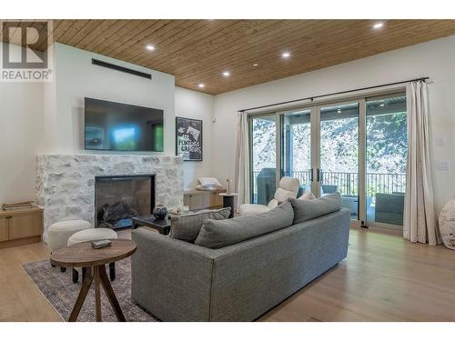 9961 Purcell Drive, Vernon, BC - Indoor Photo Showing Living Room With Fireplace