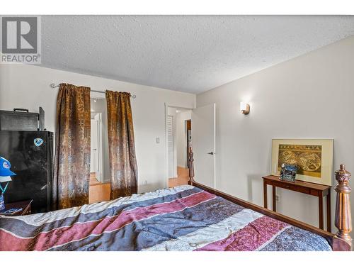1665 Ufton Court Unit# 228, Kelowna, BC - Indoor Photo Showing Bedroom
