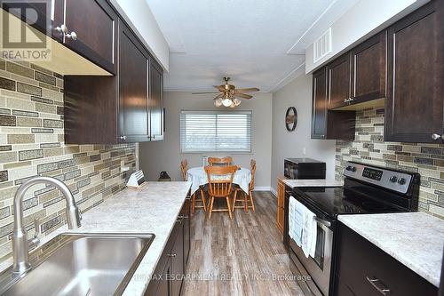 602 - 8 Woodman Drive S, Hamilton (Corman), ON - Indoor Photo Showing Kitchen With Upgraded Kitchen