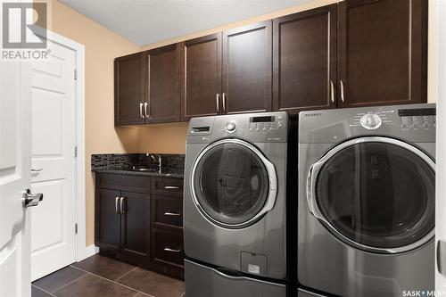 4213 Green Rose Crescent E, Regina, SK - Indoor Photo Showing Laundry Room