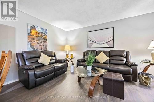 409 - 61 Markbrook Lane, Toronto, ON - Indoor Photo Showing Living Room