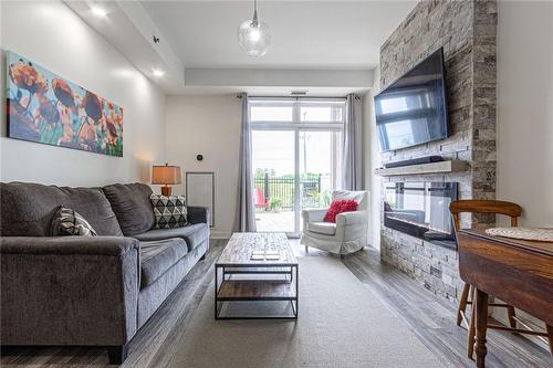 5317 Upper Middle Road|Unit #127, Burlington, ON - Indoor Photo Showing Living Room With Fireplace