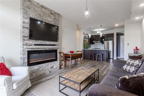 5317 Upper Middle Road|Unit #127, Burlington, ON - Indoor Photo Showing Living Room With Fireplace