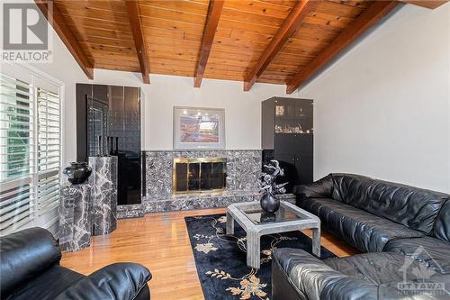 2039 Chalmers Road, Ottawa, ON - Indoor Photo Showing Living Room With Fireplace