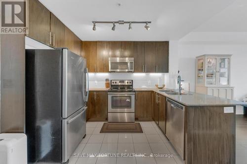 2010 - 3985 Grand Park Drive, Mississauga, ON - Indoor Photo Showing Kitchen With Double Sink