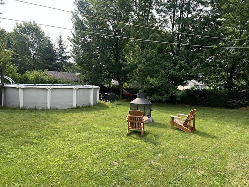 Backyard - 318 Imp. De La Roseraie, Granby, QC - Outdoor With Above Ground Pool With Backyard