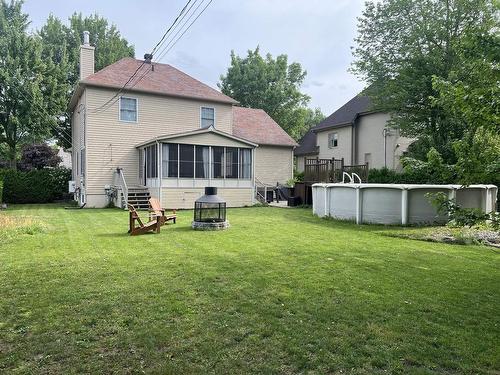 Back facade - 318 Imp. De La Roseraie, Granby, QC - Outdoor With Above Ground Pool