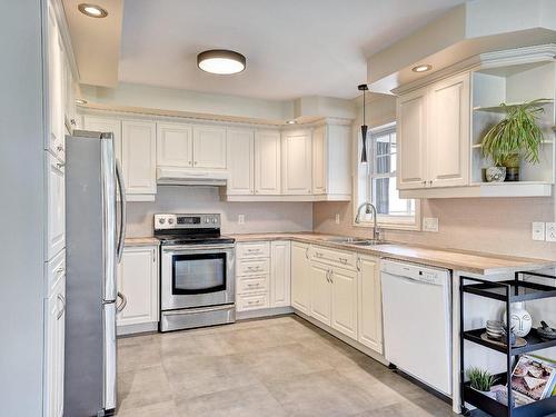 Kitchen - 318 Imp. De La Roseraie, Granby, QC - Indoor Photo Showing Kitchen With Double Sink