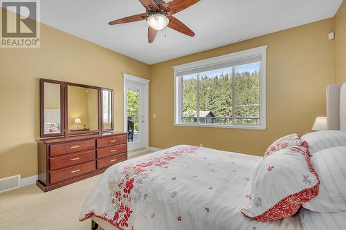 1077 Peak Point Drive, West Kelowna, BC - Indoor Photo Showing Bedroom