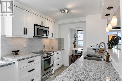 1712 - 511 The West Mall, Toronto W08, ON - Indoor Photo Showing Kitchen With Double Sink With Upgraded Kitchen