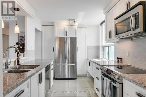 1712 - 511 The West Mall, Toronto W08, ON - Indoor Photo Showing Kitchen With Stainless Steel Kitchen With Double Sink With Upgraded Kitchen