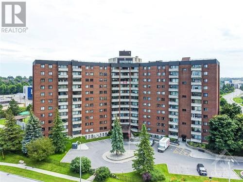 3100 Carling Avenue Unit#219, Ottawa, ON - Outdoor With Balcony With Facade