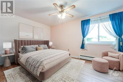 Virtually Staged - 3100 Carling Avenue Unit#219, Ottawa, ON - Indoor Photo Showing Bedroom