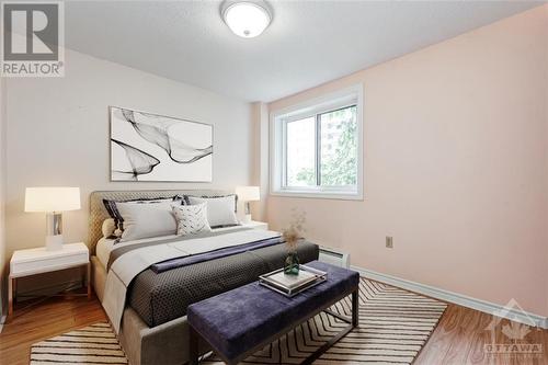 Virtually Staged - 3100 Carling Avenue Unit#219, Ottawa, ON - Indoor Photo Showing Bedroom