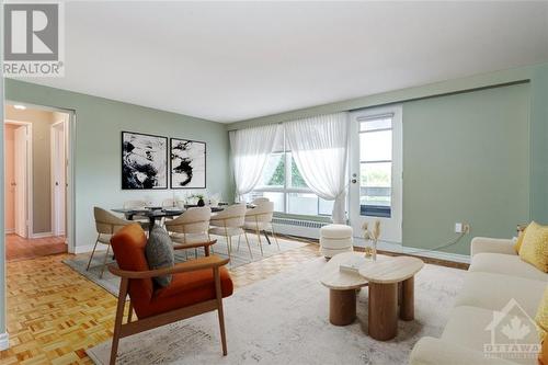 Virtually Staged - 3100 Carling Avenue Unit#219, Ottawa, ON - Indoor Photo Showing Living Room