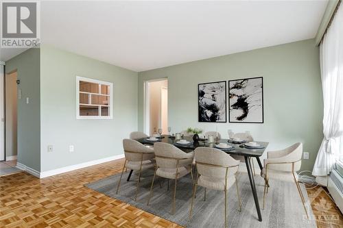 Virtually Staged - 3100 Carling Avenue Unit#219, Ottawa, ON - Indoor Photo Showing Dining Room