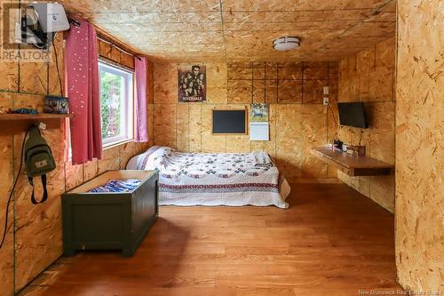 520 Route 820, Baxters Corner, NB - Indoor Photo Showing Bedroom With Fireplace