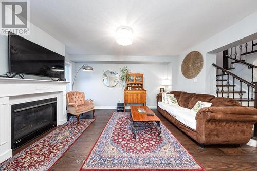 7810 Sassafras Trail, Niagara Falls, ON - Indoor Photo Showing Living Room With Fireplace