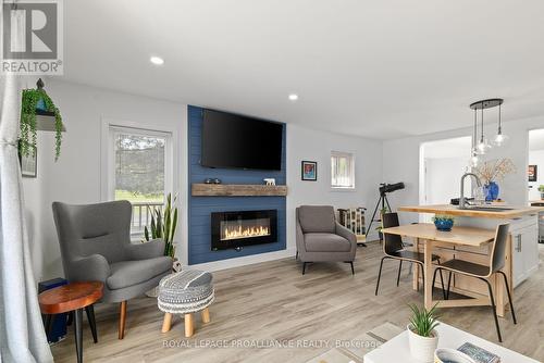 3191 County Road 10, Prince Edward County (South Marysburgh), ON - Indoor Photo Showing Living Room With Fireplace