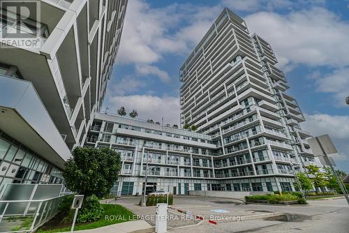 310 - 65 Speers Road, Oakville, ON - Outdoor With Facade