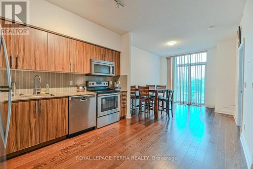 310 - 65 Speers Road, Oakville, ON - Indoor Photo Showing Kitchen With Stainless Steel Kitchen