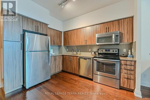 310 - 65 Speers Road, Oakville, ON - Indoor Photo Showing Kitchen With Stainless Steel Kitchen