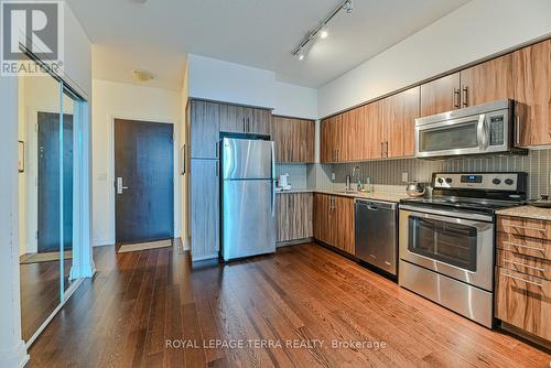 310 - 65 Speers Road, Oakville, ON - Indoor Photo Showing Kitchen With Stainless Steel Kitchen