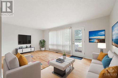 Living Room - Virtually Staged - 2270 Cotters Crescent S Unit#249, Ottawa, ON - Indoor Photo Showing Living Room