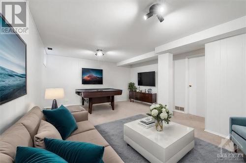 Basement (Family Room) - Virtually Staged - 2270 Cotters Crescent S Unit#249, Ottawa, ON - Indoor Photo Showing Living Room