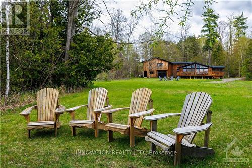 6 Bluff Point Drive, Greater Madawaska, ON - Outdoor With Backyard