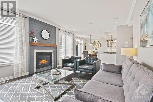 160 Whernside Terrace, Ottawa, ON - Indoor Photo Showing Living Room With Fireplace