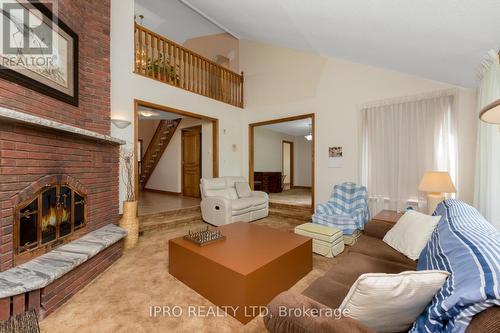 9132 Ninth Line, Halton Hills, ON - Indoor Photo Showing Living Room With Fireplace