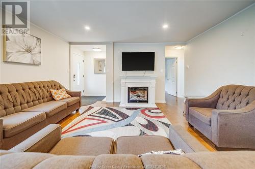 2391 Meldrum Road, Windsor, ON - Indoor Photo Showing Living Room With Fireplace