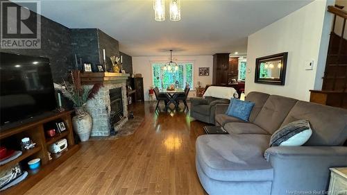 79 Chemin 36 No. 1 Road, Saint-Quentin, NB - Indoor Photo Showing Living Room With Fireplace