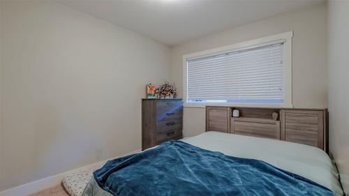 32-600 Boynton Place, Kelowna, BC - Indoor Photo Showing Bedroom