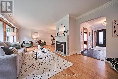 27 Mcnab Boulevard, Toronto (Cliffcrest), ON - Indoor Photo Showing Living Room With Fireplace