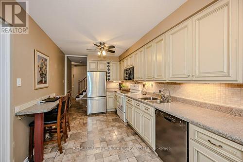 1388 Stonecutter Drive, Oakville, ON - Indoor Photo Showing Kitchen With Double Sink