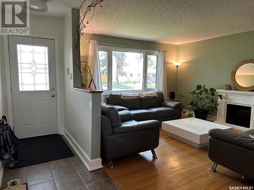 41 Dunning Crescent, Regina, SK - Indoor Photo Showing Living Room With Fireplace