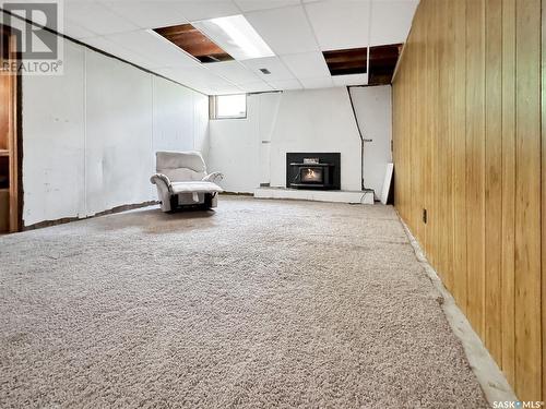 318 Orton Street, Cut Knife, SK - Indoor Photo Showing Other Room With Fireplace