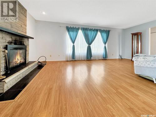 318 Orton Street, Cut Knife, SK - Indoor Photo Showing Living Room With Fireplace