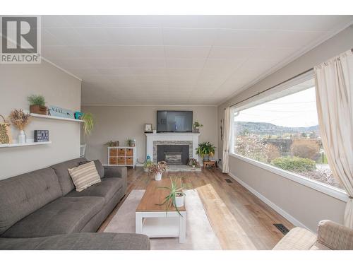 2125 Francis Street, Vernon, BC - Indoor Photo Showing Living Room With Fireplace