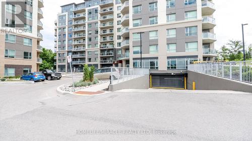 501 - 58 Lakeside Terrace W, Barrie (Little Lake), ON - Outdoor With Balcony With Facade