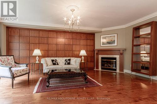 15 - 2400 Neyagawa Boulevard, Oakville, ON - Indoor Photo Showing Living Room With Fireplace