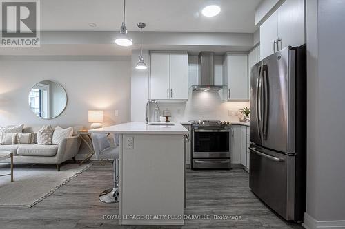 428 - 128 Grovewood Common, Oakville, ON - Indoor Photo Showing Kitchen With Stainless Steel Kitchen