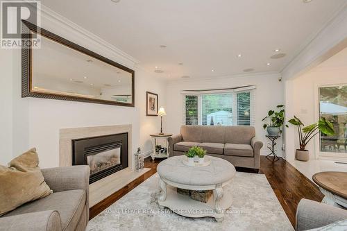 1457 Postmaster Drive, Oakville, ON - Indoor Photo Showing Living Room With Fireplace