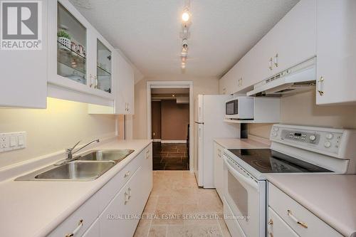 1457 Postmaster Drive, Oakville, ON - Indoor Photo Showing Kitchen With Double Sink